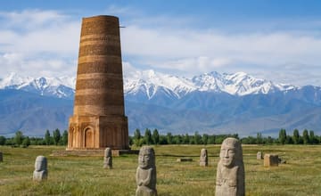 Башня Бурана и каменные балбалы на фоне Кыргызского Ала-Тоо
