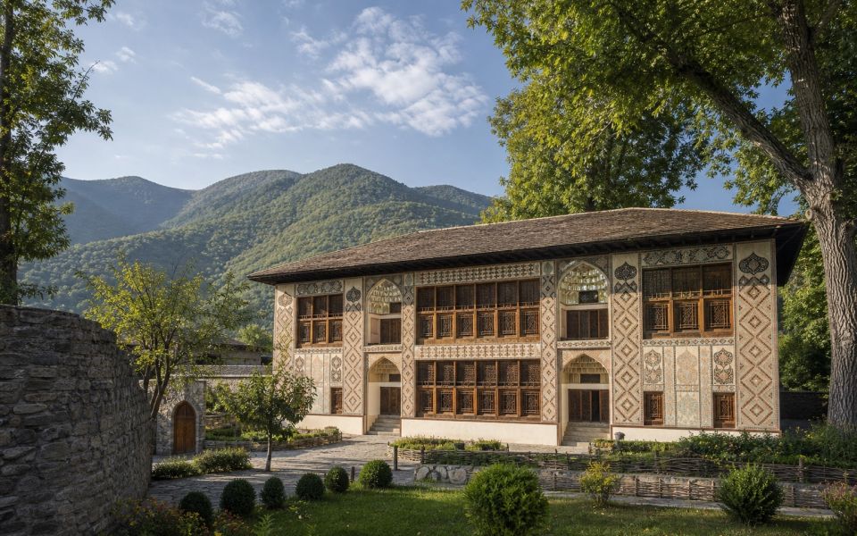 The Palace of the Sheki Khans, the mountain slopes and historical houses of Sheki