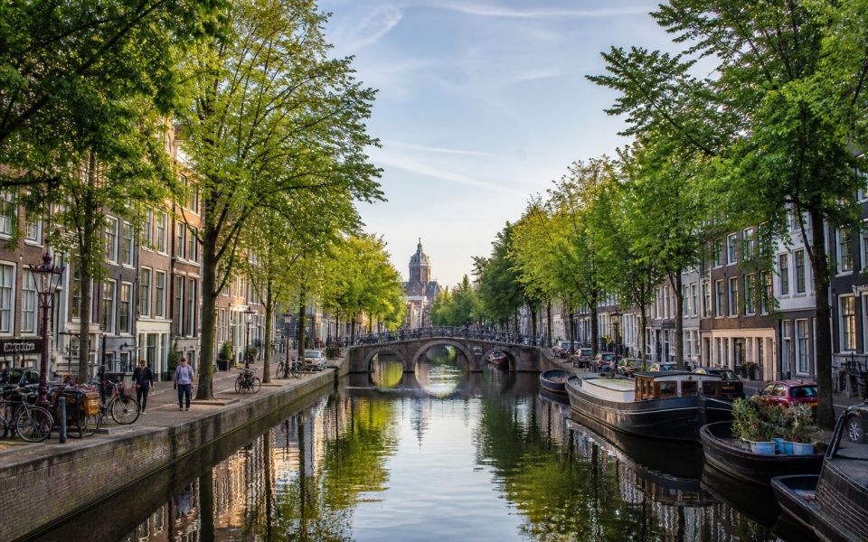 Canals, narrow historic houses, and bicycles in Amsterdam