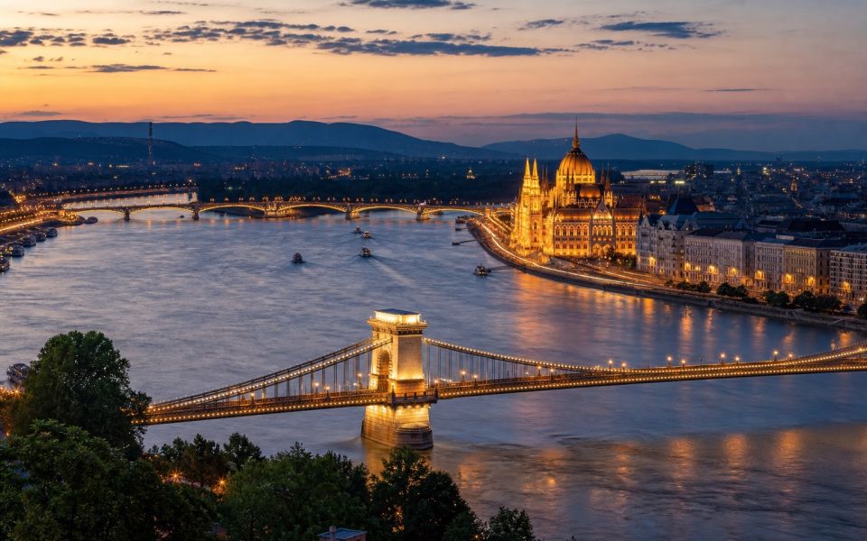 The Hungarian Parliament, Chain Bridge, and the Danube River in Budapest at night