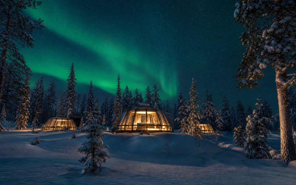 Snowy forests, glass houses, and the northern lights in Finnish Lapland