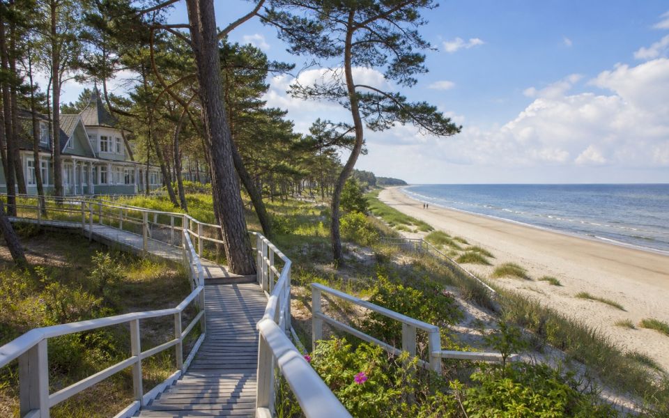 Sandy beach, pine dunes and wooden villas of Jurmala