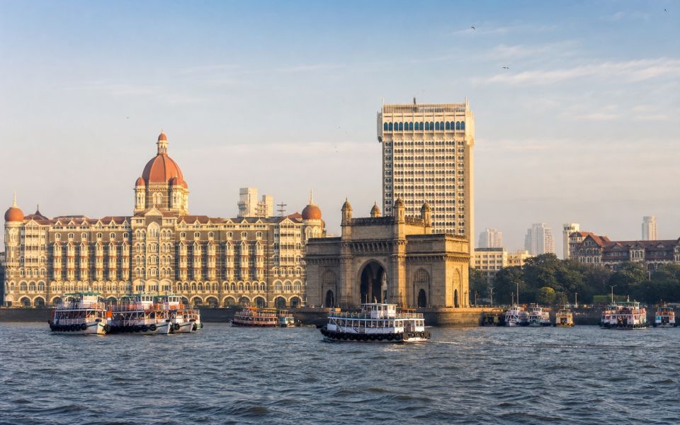 The Gateway of India, the Mumbai waterfront, and the Arabian Sea skyline