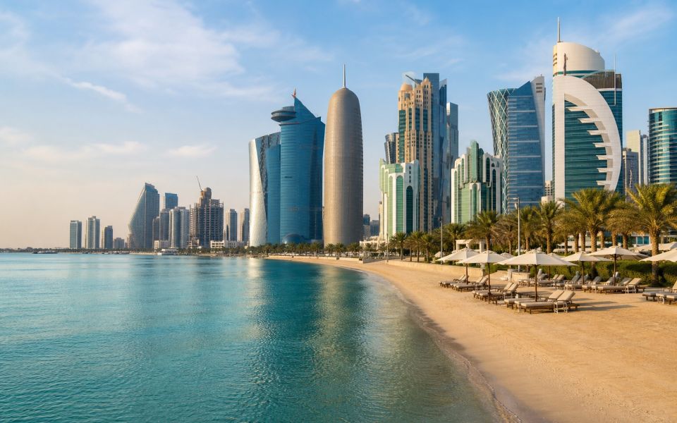 West Bay's modern towers and the city beach on Doha's coastline