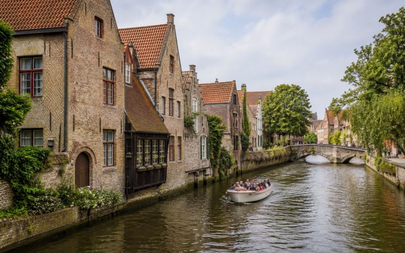 Canal, stone bridge and medieval houses of Bruges