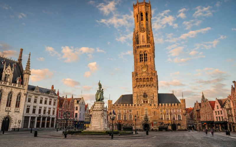 The Belfort Tower and the stepped facades of the Markt Square in Bruges
