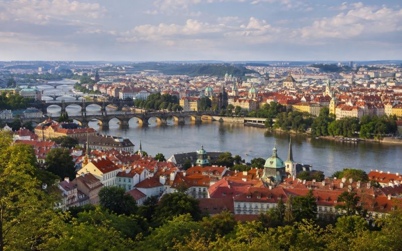 Red roofs, bridges, and the Vltava River from Petrin Hill in Prague