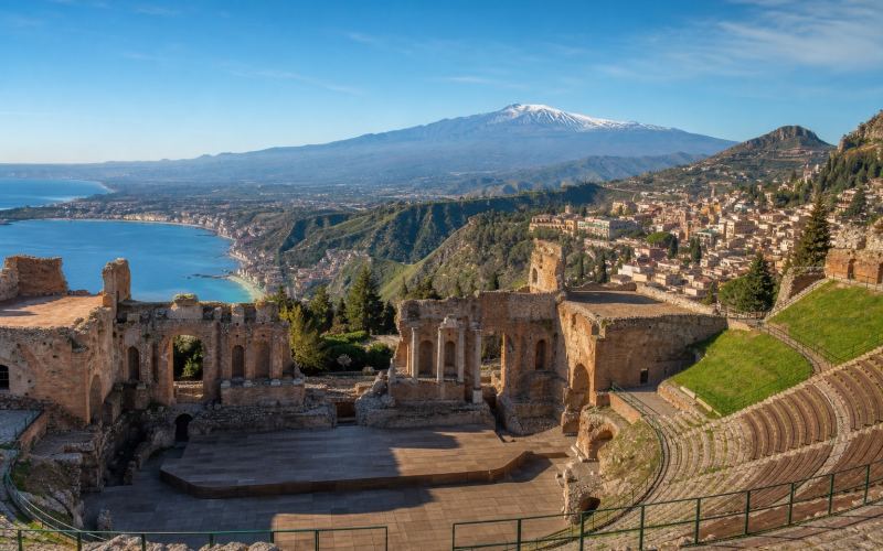 The ancient theatre of Taormina, the sea and Mount Etna in eastern Sicily
