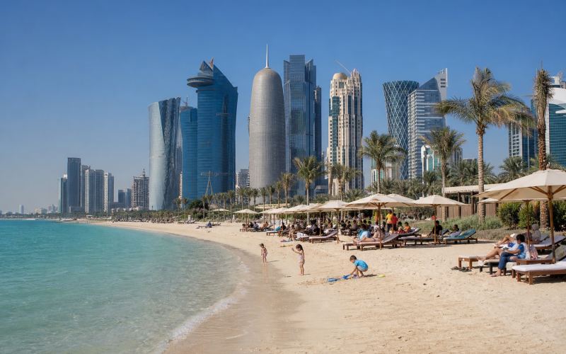 A city beach with palm trees and skyscrapers in the West Bay area of Doha