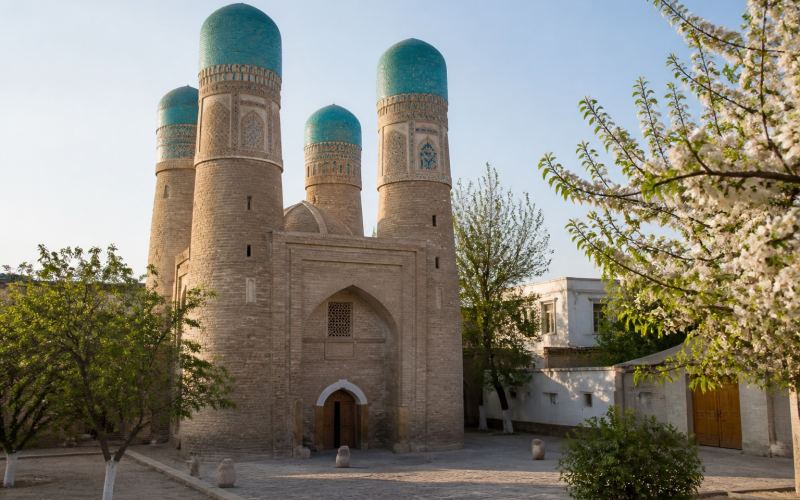 The Chor-Minor Madrasah with its four turquoise towers in Bukhara