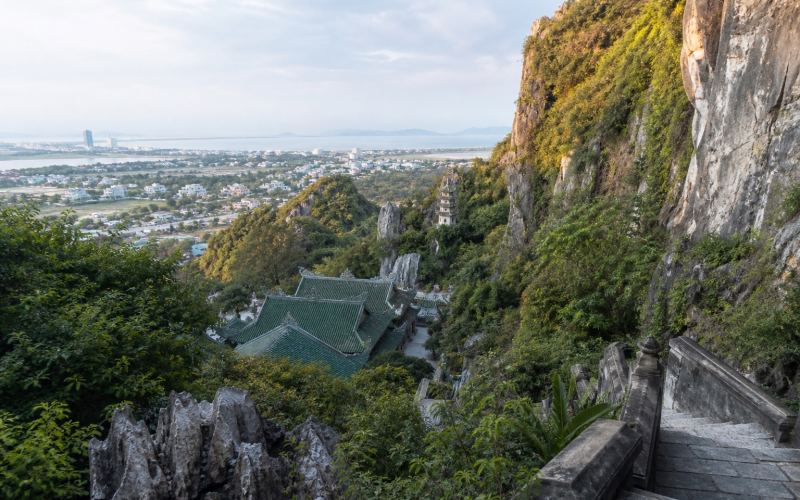 Marble Mountains, a temple, and tropical greenery near Da Nang